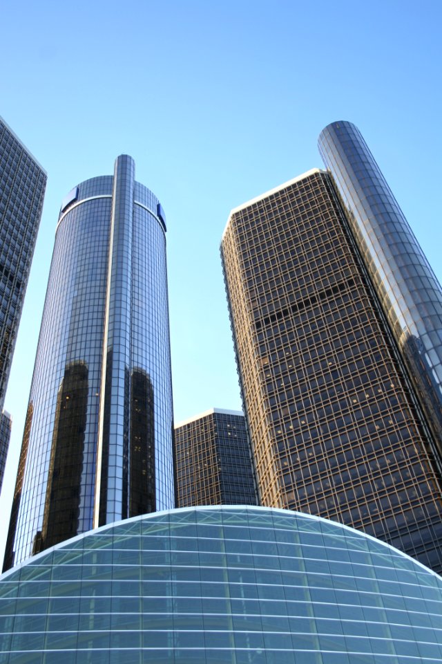 Glass High Rise Building On Low Angle Photography At Daytime photo