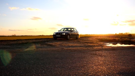 Car Parked Next To Field