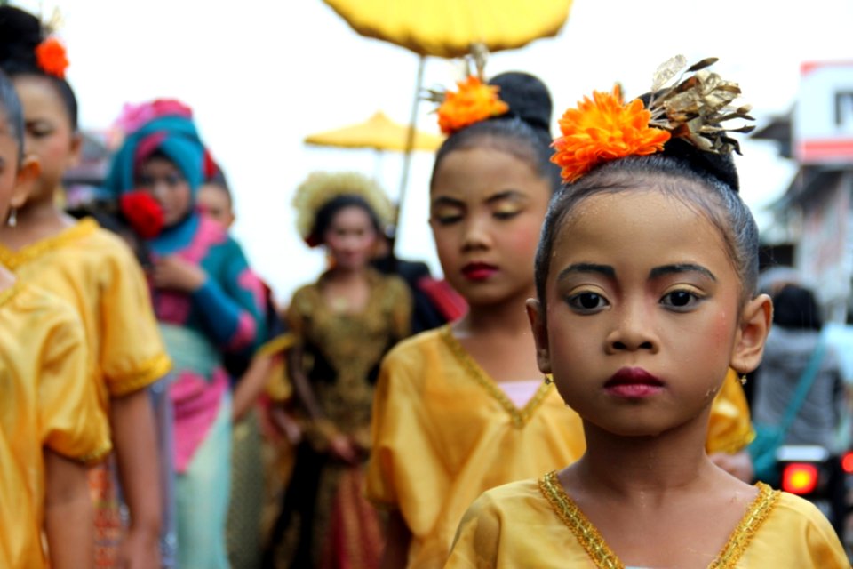 Asian Children In Gold Dresses