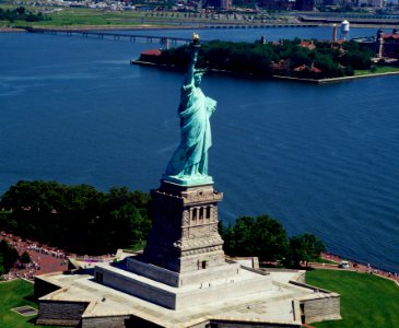 Statue of Liberty with Ellis Island in the background. Original image from Carol M. Highsmith’s America, Library of Congress collection. photo