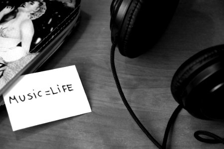 Headphones And Message Beside