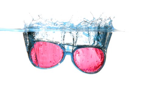 Black Framed Red Aviator Sunglasses On Water photo