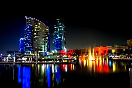 City Skyline Beside Water During Night photo
