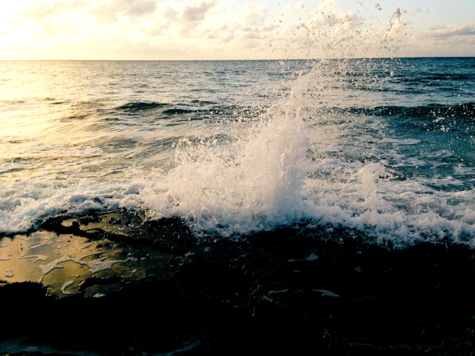 Waves Breaking On Beach