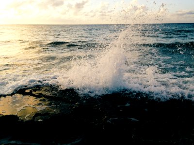 Waves Breaking On Beach
