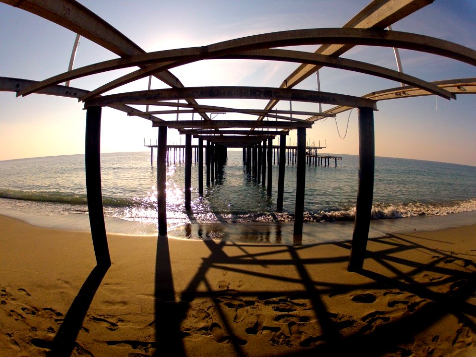 Pier On Sandy Beach