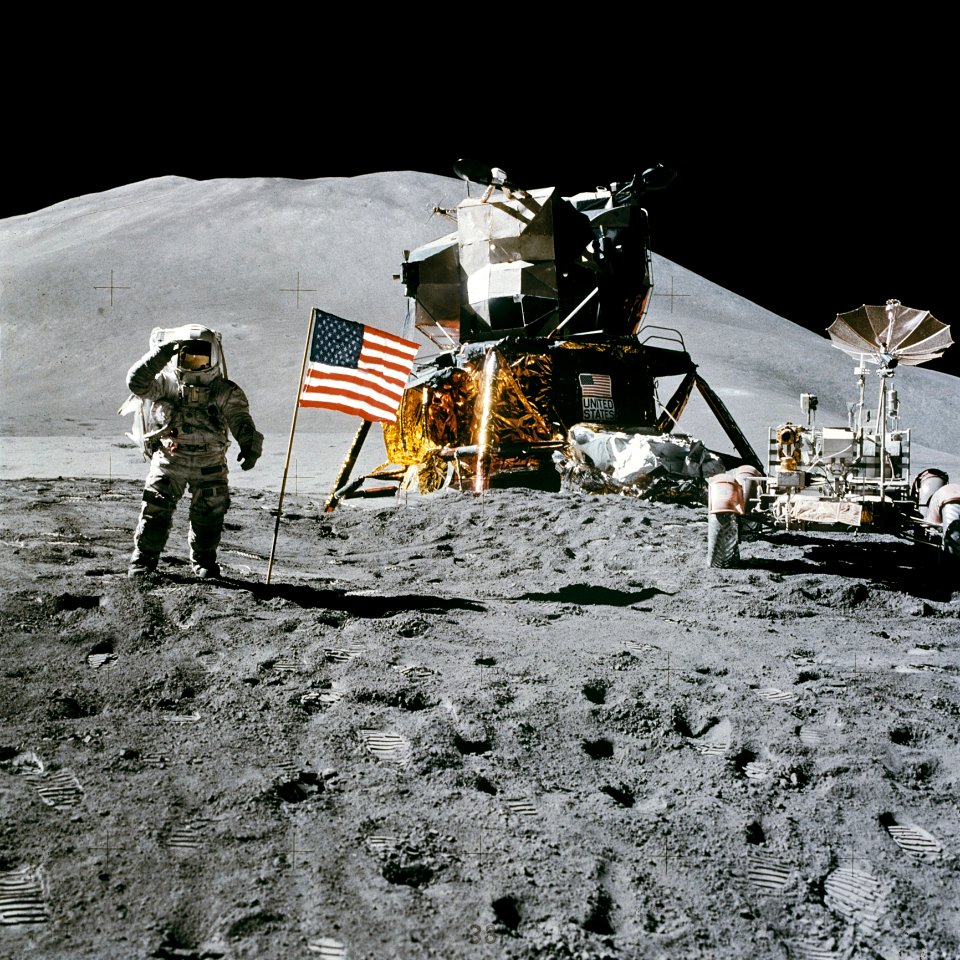 Astronaut Standing Beside American Flag On The Moon
