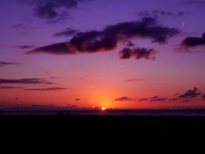 Sunset Over Ocean Horizon