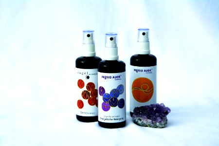 3 Spray Bottles Near Purple Geode