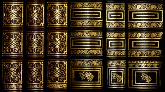 Black And Golden Stacked Book photo