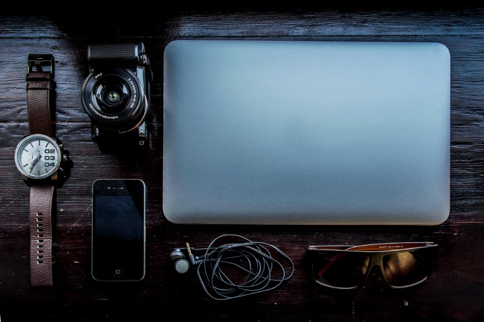 Apple Macbook With Camera And Mobile