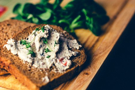 Bread With Ravioli Toppings On Brown Table photo