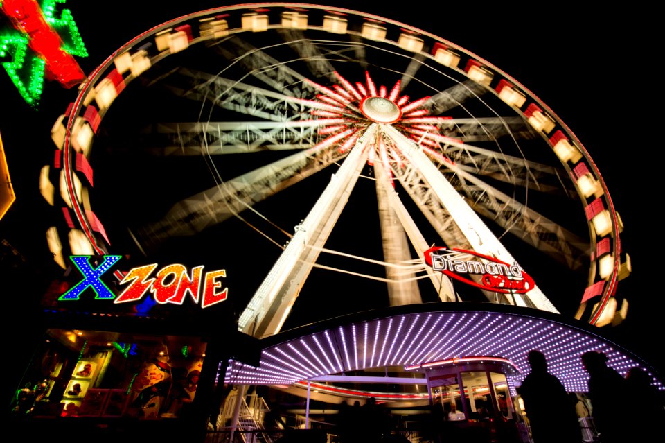 Ferris Wheel In Funfair At Night