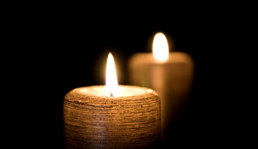 2 Lighted Candle In Lit Room