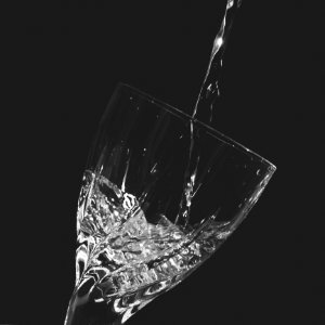 Time-lapse Clear Wine Glass With Water photo
