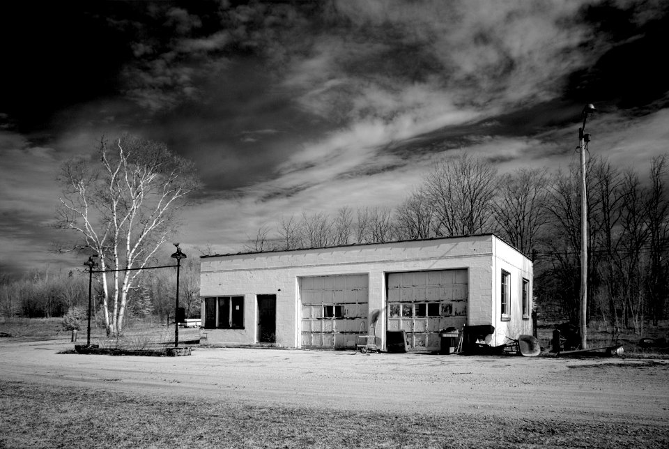 Old gas station along the road in rural upperstate Michigan (2008) by Carol M. Highsmith. Original image from Library of Congress.