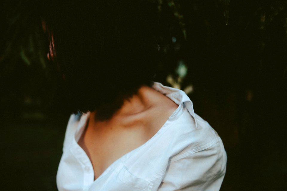 Woman In White V-neck Shirt