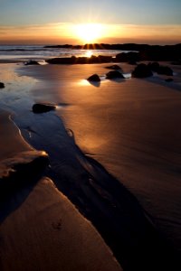 Bodies Of Water Surrounding Sand