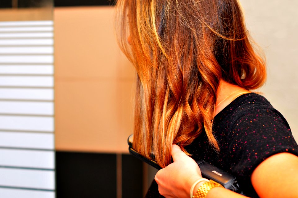 Woman Using Flatiron