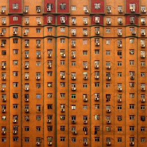 Brown Concrete Building With Aircon Every Room photo