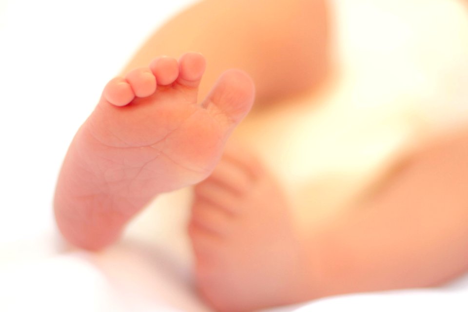 Babys Right Foot In Macro Photograph