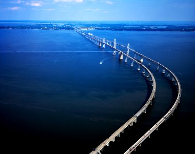 The Chesapeake Bay Bridge (commonly known as the Bay Bridge) is a major dual-span bridge in the U.S. state of Maryland. Original image from Carol M. Highsmith’s America, Library of Congress collection.