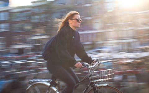 Woman Riding Bicycle photo