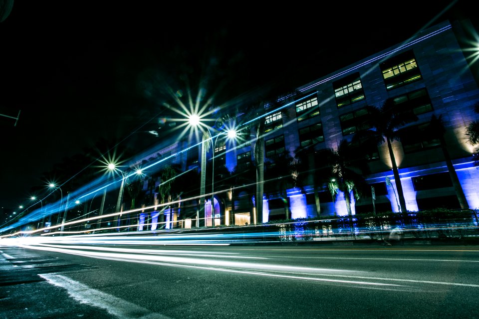 Lights Of Cars Driving In City At Night