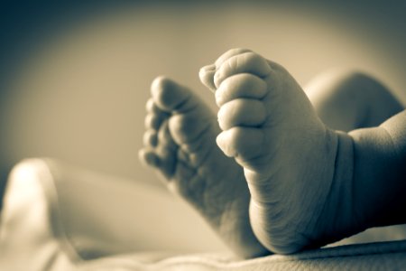 Babys Feet In Gray Scale Photography photo