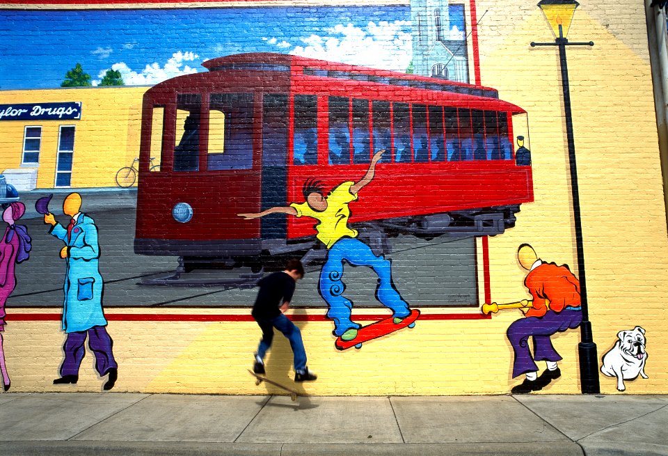 Actual skateboarders mimic those on a street mural, Louisville, Kentucky (1980-2006) by Carol M. Highsmith. Original image from Library of Congress.