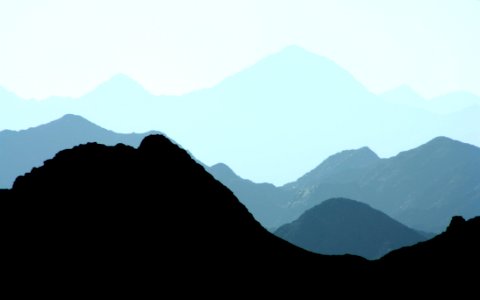 Silhouette Of Mountains During Daytime photo