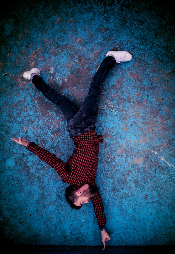 Man Standing On Finger Photo