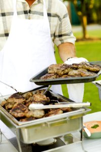 Person Holding Stainless Steel Tray photo