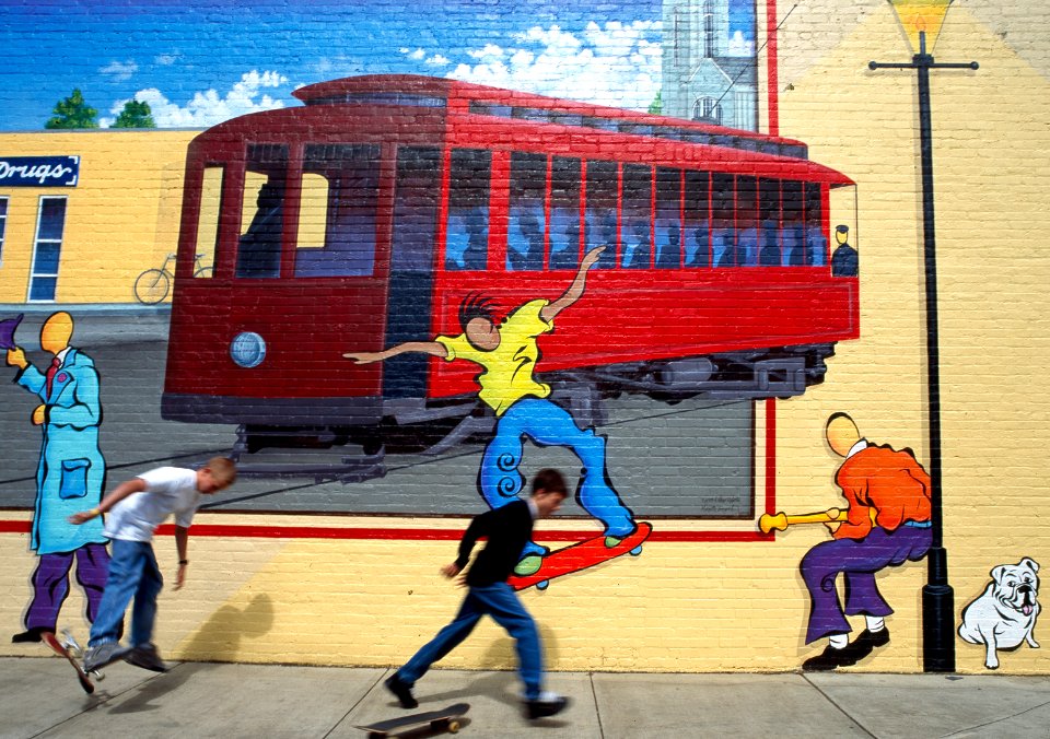 Actual skateboarders mimic those on a street mural, Louisville, Kentucky (1980-2006) by Carol M. Highsmith. Original image from Library of Congress.