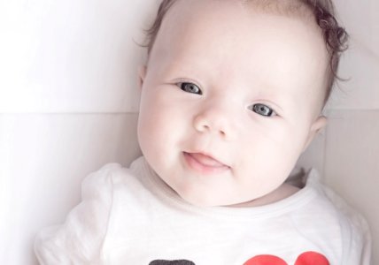 Baby Wearing White Red And Black T Shirt photo