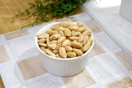 Peanuts In White Ceramic Bowl photo