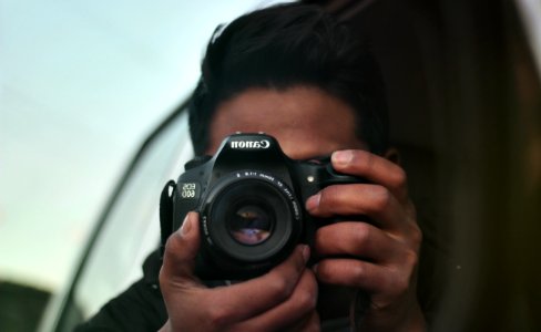 Photographer With Canon Camera