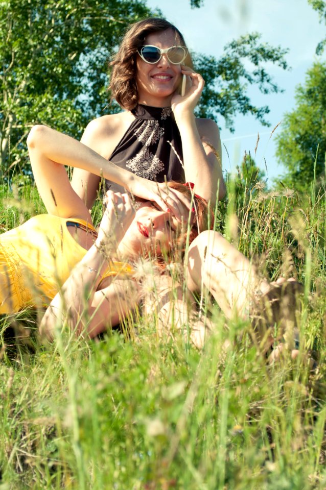 Two Woman On Green Grass During Day Time