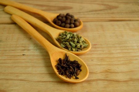 Vegetables And Beans On Brown Wooden Measuring Spoon photo