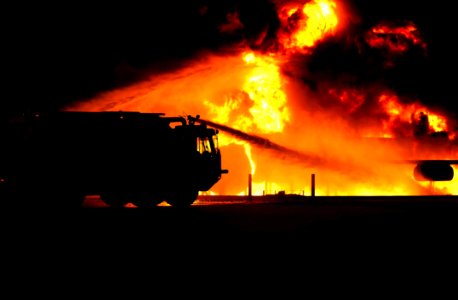 Firetruck Spraying Water On Fire