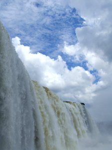 Waterfalls Under Blue Sky With White Clouds During Daytime photo