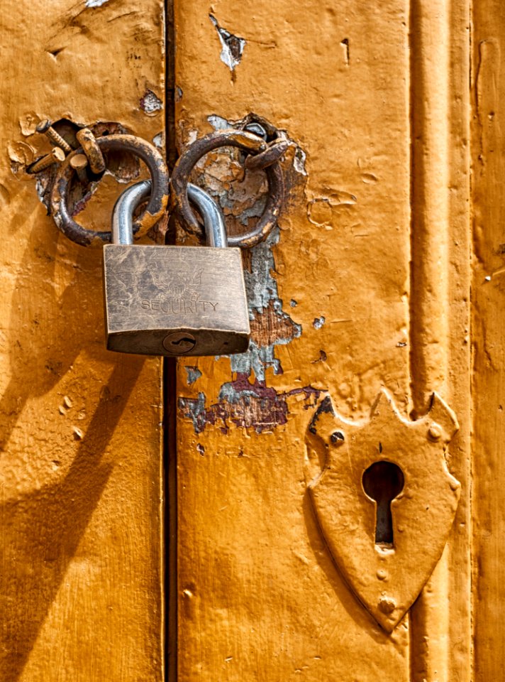 Padlock On Metal Door