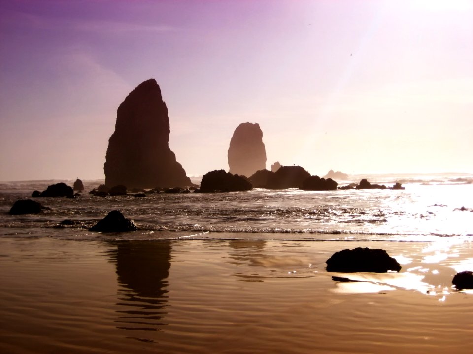 Rocky Shores Of Beach At Sunset