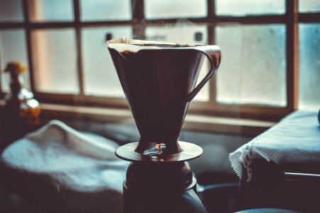 Black And Grey Ceramic Cup With Hot Coffee photo