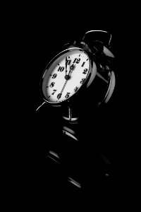 Black Analog Alarm Clock photo