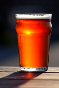 Red Beverage In Clear Drinking Glass photo