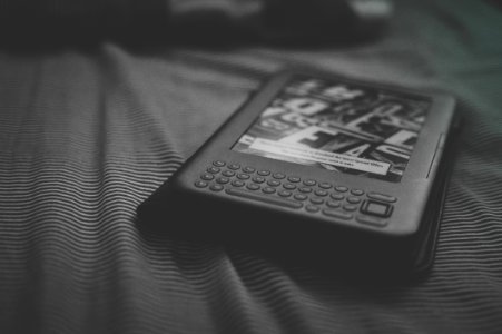 Kindle Reader On Bed photo