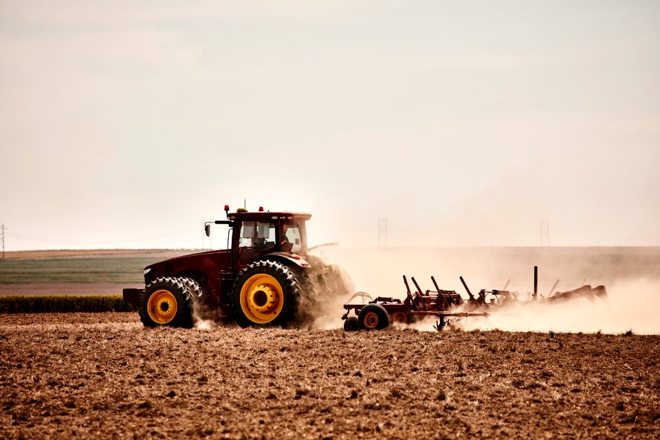 A farmer kicks up dust as he readies the ground for planting near Bristol in Prowers County, Colorado. Original image from Carol M. Highsmith’s America, Library of Congress collection.