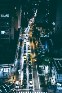 Cars On Black Asphalt Road During Nighttime photo