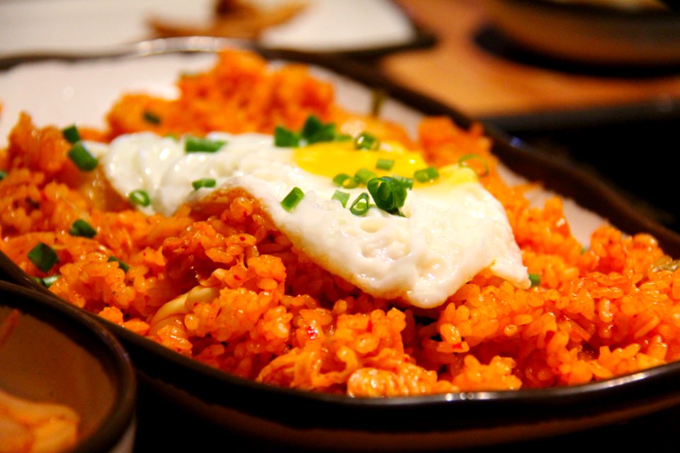 White And Yellow Sunny Side Up Egg On Fried Rice photo